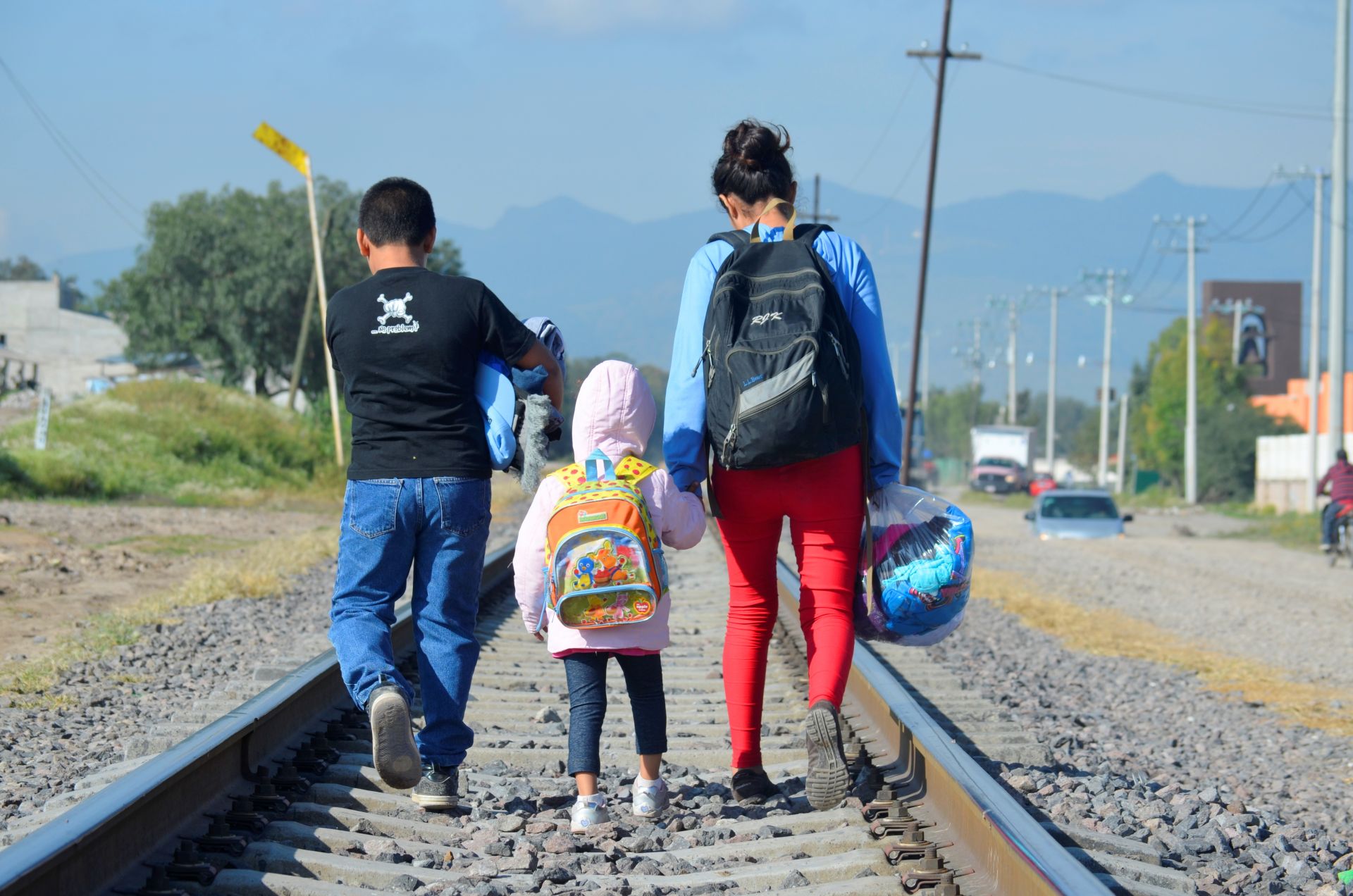 On 10 December 2014 outside of La Casa del Migrante, a catholic shelter that supports migrants near the Lechería Train Station, in the municipality of Tultitlan, State of Mexico, Maria [NAME CHANGED], 16 (on right), from Honduras travels north with her younger siblings, expecting to cross the border to the United States to reunite with her family.

Mexico, 7 July 2014  Mexico and Central America countries are facing a very serious situation due to the increasing numbers of unaccompanied migrant children from Mexico and Central America countries arriving in the USA. According to the US government data, over 47,000 unaccompanied children have been apprehended at the southwest border in the past eight months, almost double the number apprehended between October 2012 and September 2013.