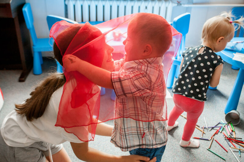 Maria, 10 plays with her younger brother Max, 4 at the day care center in Rzeszow, Poland. Maria and Max are refugees from Sambor, Ukraine and they currently live in Rzeszow, Poland.

Women and children account for more than 94% of the Ukrainian refugee population in Poland.    
There are insufficient spaces and trained personnel to support young children from the refugee population, particularly during the initial period of arrival.   
Early Childhood Development (ECD) centers 